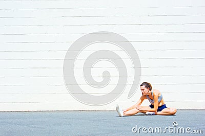 Urban Mature Woman Exercising Stock Photo