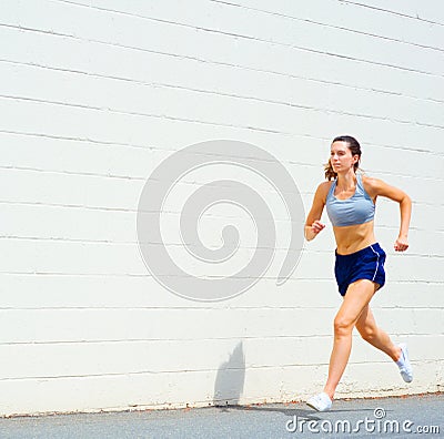 Urban Mature Woman Exercising Stock Photo