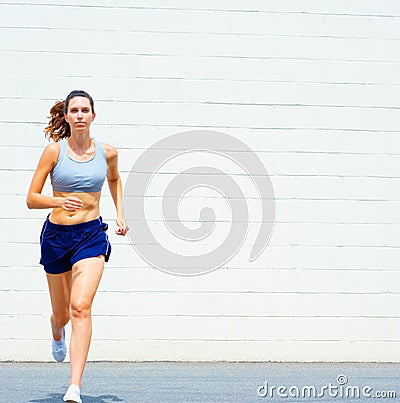 Urban Mature Woman Exercising Stock Photo