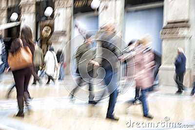 Urban move, people walking in city, motion blur, zoom effect Stock Photo