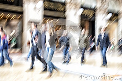 Urban move, people walking in city, motion blur, zoom effect Stock Photo