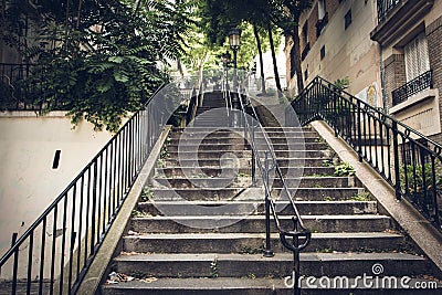 Urban nature stairs in Paris at quartier Montmartre Stock Photo