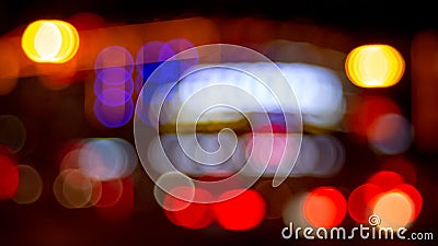 Urban night illumination background with artificially blurred neon and led lighting of buildings and roads with retro noise Stock Photo