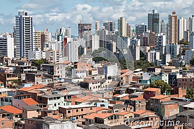Urban social contrast. Buildings and slum. Inequality Editorial Stock Photo