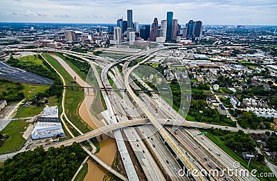 Urban Sprawl Bridge and Overpasses High Aerial Drone view over Houston Texas Urban Highway view Stock Photo