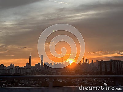 Urban Sunset: City Skies Ablaze Stock Photo