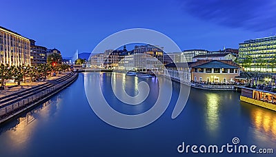 Urban view with famous fountain and Rhone river Stock Photo