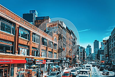 Urban views of New York.Soho district. Street, people and tourists on it, car traffic Editorial Stock Photo