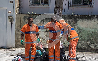 The urban workers from COMLURB, the municipal cleaning company, Editorial Stock Photo