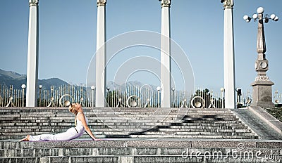 Urban Yoga bhujangasana cobra pose Stock Photo