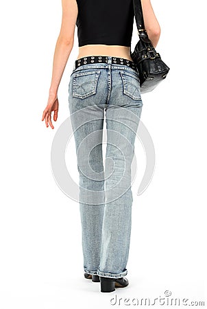 Urban young woman in jeans Stock Photo