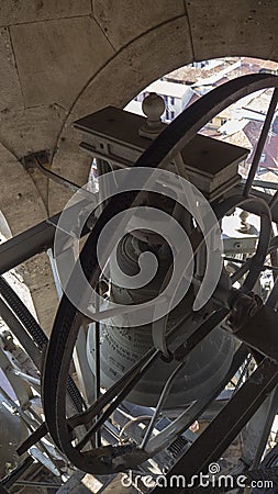 Urgnano, Bergamo, Italy. View of the bells of the bell tower of the main church in the center of the village Editorial Stock Photo