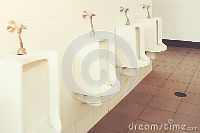 Urinal Tile Wall Stock Photo