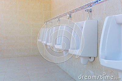 Urinals Men public in toilet room, wc Stock Photo