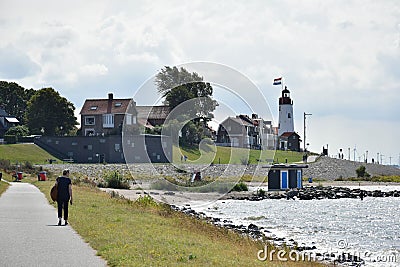 The Urk lighthouse is still doing its job Editorial Stock Photo