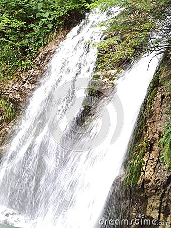 The Urlatoarea waterfall in Bucegi Stock Photo