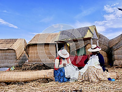 Women uros making tissues on their straw island Editorial Stock Photo