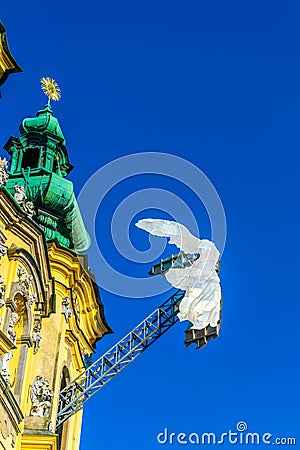 Ursulinenkirche church situated on the Landstrasse street in the Austrian city Linz with a sculpture of white angel Editorial Stock Photo