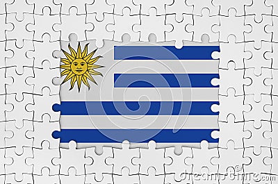 Uruguay flag in frame of white puzzle pieces with missing central part Stock Photo