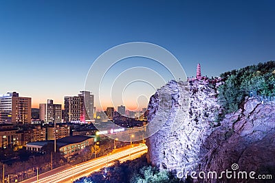 Urumqi cityscape in nightfall Stock Photo