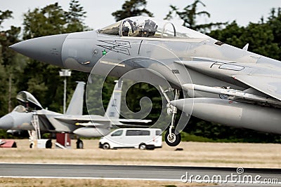 US Air Force F-15C Eagle fighter jet from 104th Fighter Wing taking off from Hohn Airbase during NATO exercise Air Defender 2023. Editorial Stock Photo