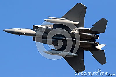US Air Force F-15 Eagle fighter jet in flight over Leeuwarden Air Base. March 28, 2017 Editorial Stock Photo