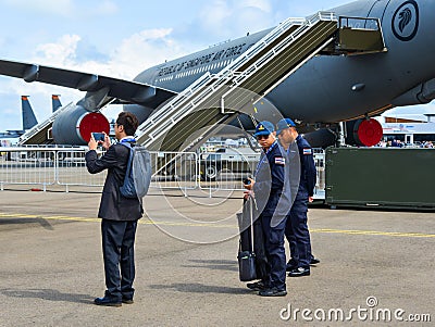 US Air Force soldiers with military aircrafts Editorial Stock Photo