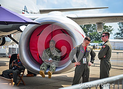 US Air Force soldiers with military aircrafts Editorial Stock Photo