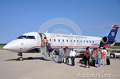 US Airways CRJ 200 at Newport News airport Editorial Stock Photo