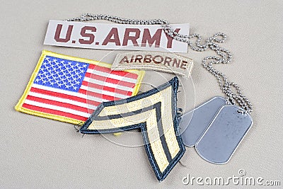 US ARMY Corporal rank patch, airborne tab, flag patch and dog tag Editorial Stock Photo
