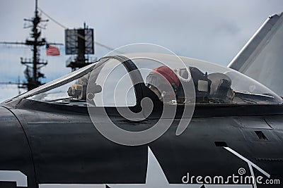 US Army military pilot ready to take off from navy aircraft carrier. Editorial Stock Photo