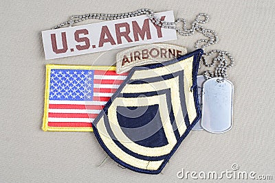 US ARMY Sergeant First Class rank patch, airborne tab, flag patch and dog tag Stock Photo