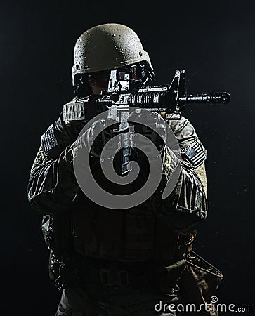 US Army soldier in the rain Stock Photo