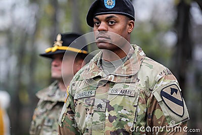 US Army soldiers of the 1st Cavalry Division take part at the Romanian National Day military parade Editorial Stock Photo