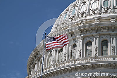 US Capitol and american flag Stock Photo