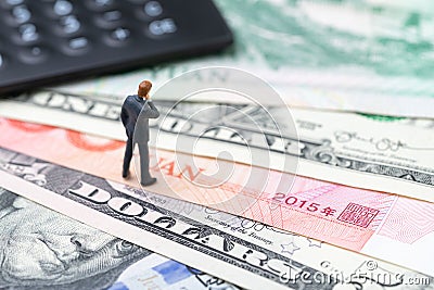 US and China finance economic direction, trade war, import and export deal and agreement concept, calculator with miniature leader Stock Photo