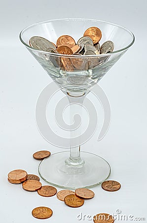 US Coins in Martini Glass Stock Photo