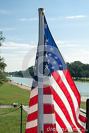 Us flag near the Lincoln Memorial Reflecting Pool Stock Photo