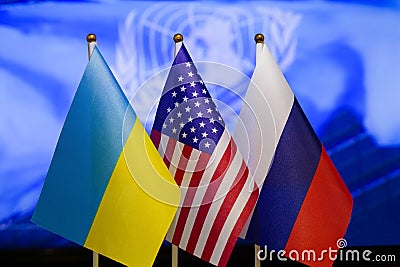 The US flag, Russian flag, Ukraine flag. Flag of USA, flag of Russia, flag of Ukraine Stock Photo