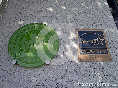 US Green Building Council LEED Silver and Energy Star Plaques on Wall Editorial Stock Photo