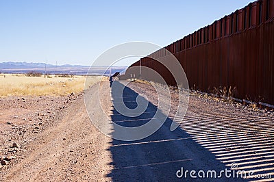 The US-Mexico border wall in Arizona desert Stock Photo