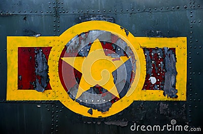 US military airplane fuselage with weathered stars and stripes logo Stock Photo