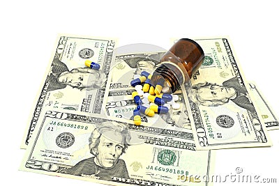 US Money and medicines, concept of money in medical business, 20 dollar bills with medicines Stock Photo