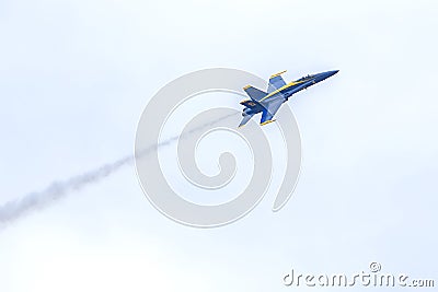 US Navy Blue Angels Hornet Fighter Jet Flying Up In The Sky With Smaoke Trail Editorial Stock Photo