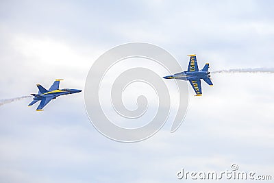 US Navy Blue Angels Hornet Fighter Jets Crossing Each Other`s Path During An Air Show Editorial Stock Photo