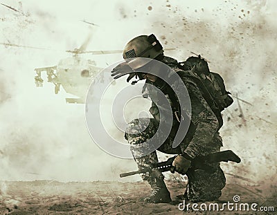 US soldier and combat helicopter approaching Stock Photo