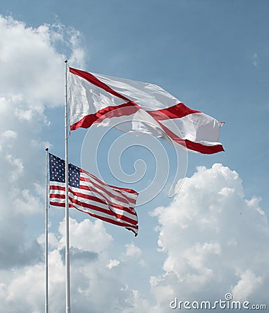 USA and Alabama flag, with clouds in background. Stock Photo