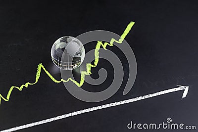 USA or America stock and investment growth, decorate shiny glass globe with United State map on dark black blackboard with chalk Stock Photo