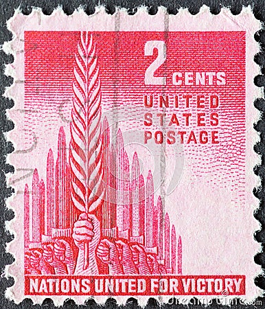 USA - Circa 1943: a postage stamp printed in the US showing raised swords behind an uplifted palm branch of peace. Text: Nations U Editorial Stock Photo