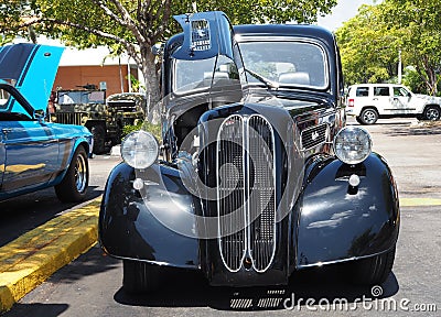 Front view of exotic antique car with kidney grills and double door engine doors Editorial Stock Photo